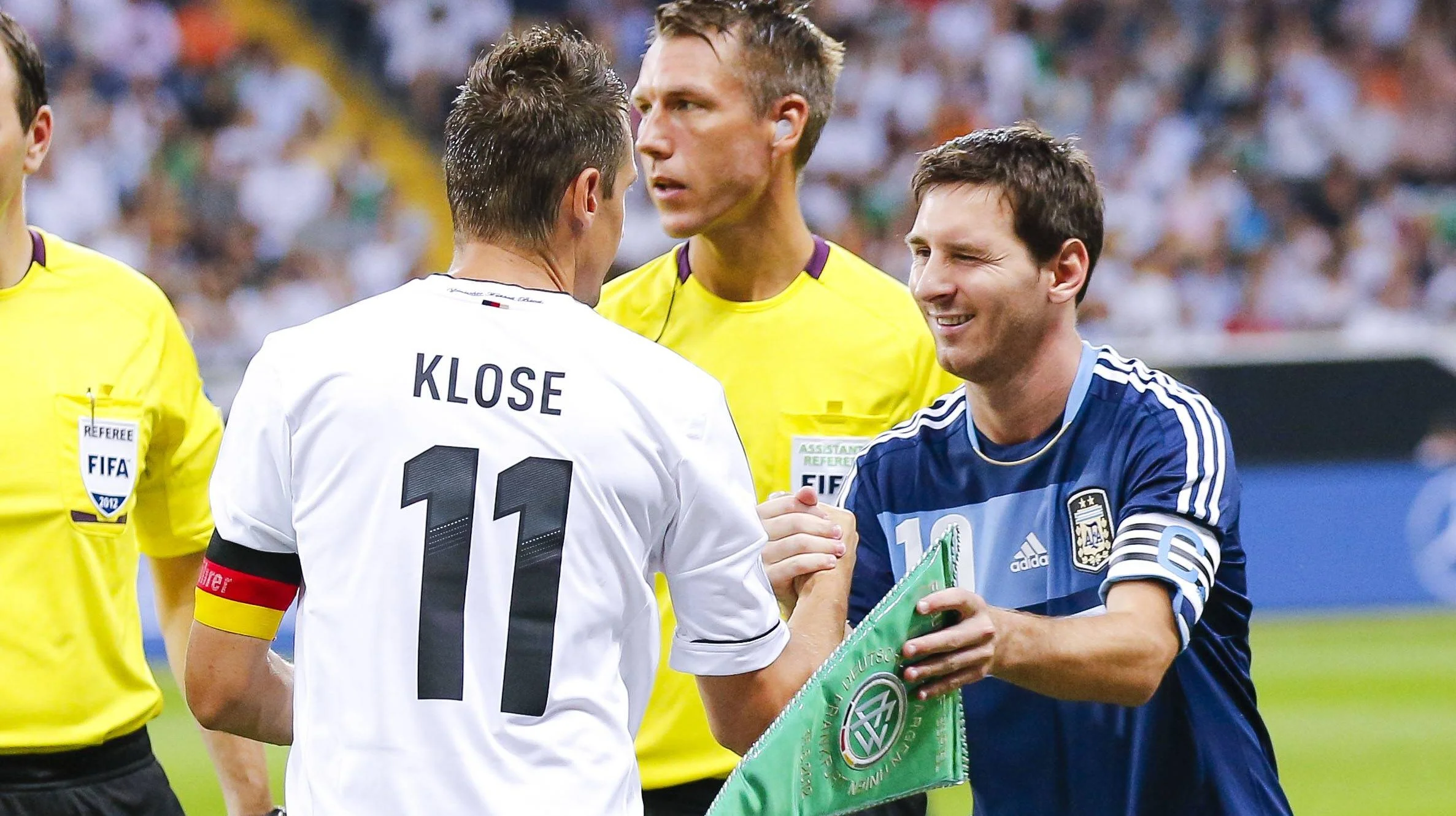 Miroslav Klose congratulates Lionel Messi on FIFA World Cup goals record